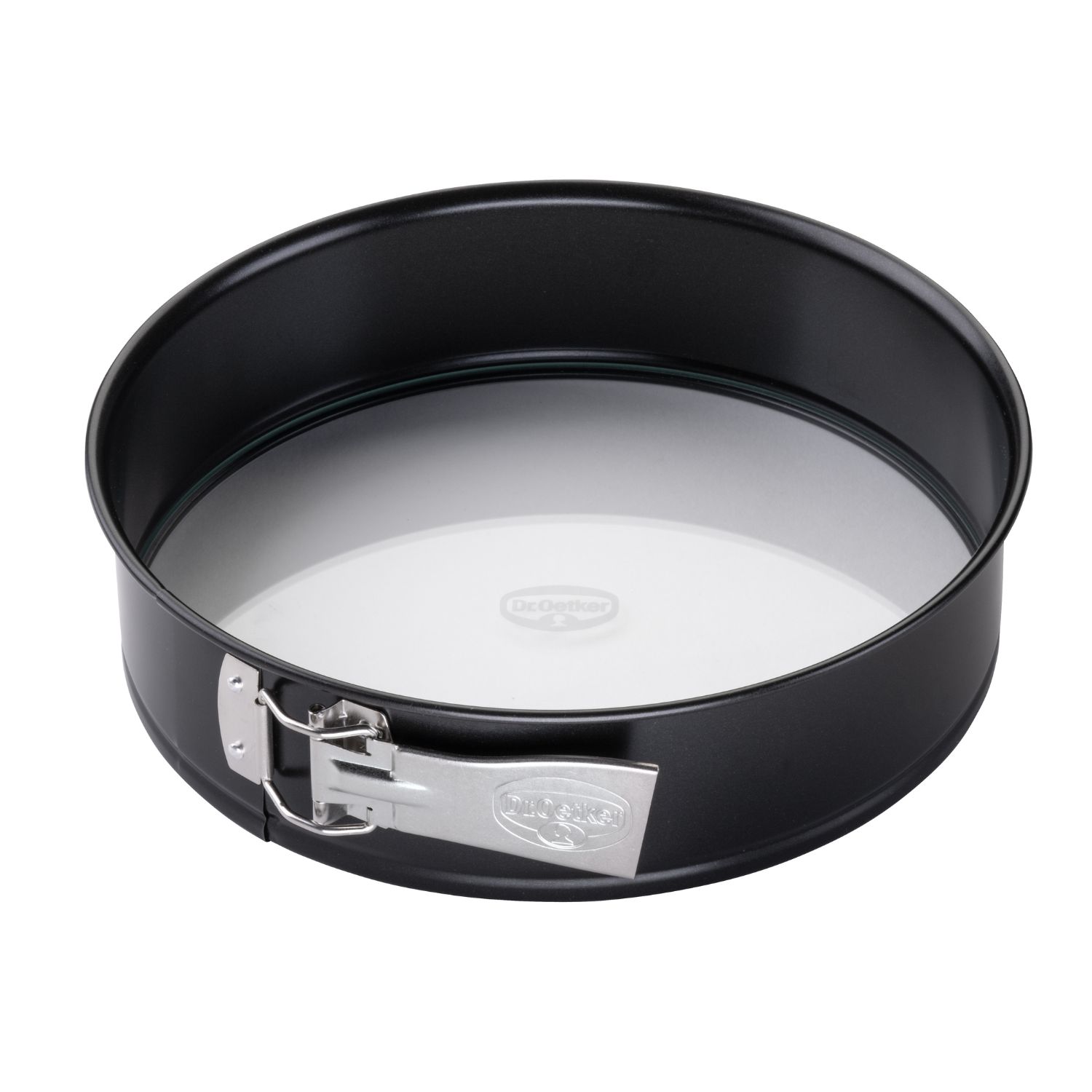 Eine schwarze Springform mit Glasboden vor weißem Hintergrund